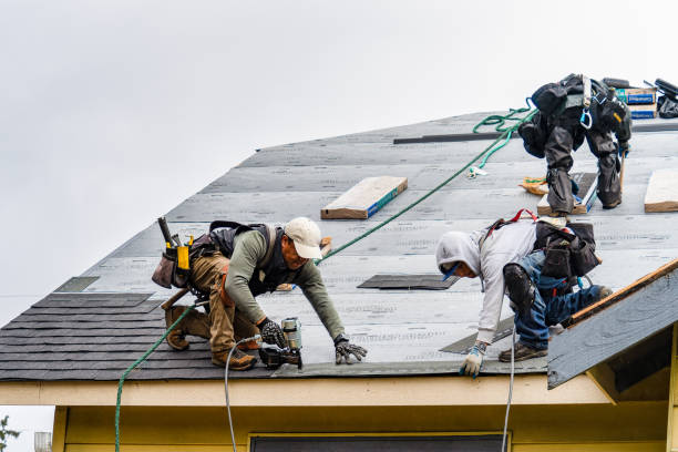 Professional Gutter Installation technician working in Reading, KS